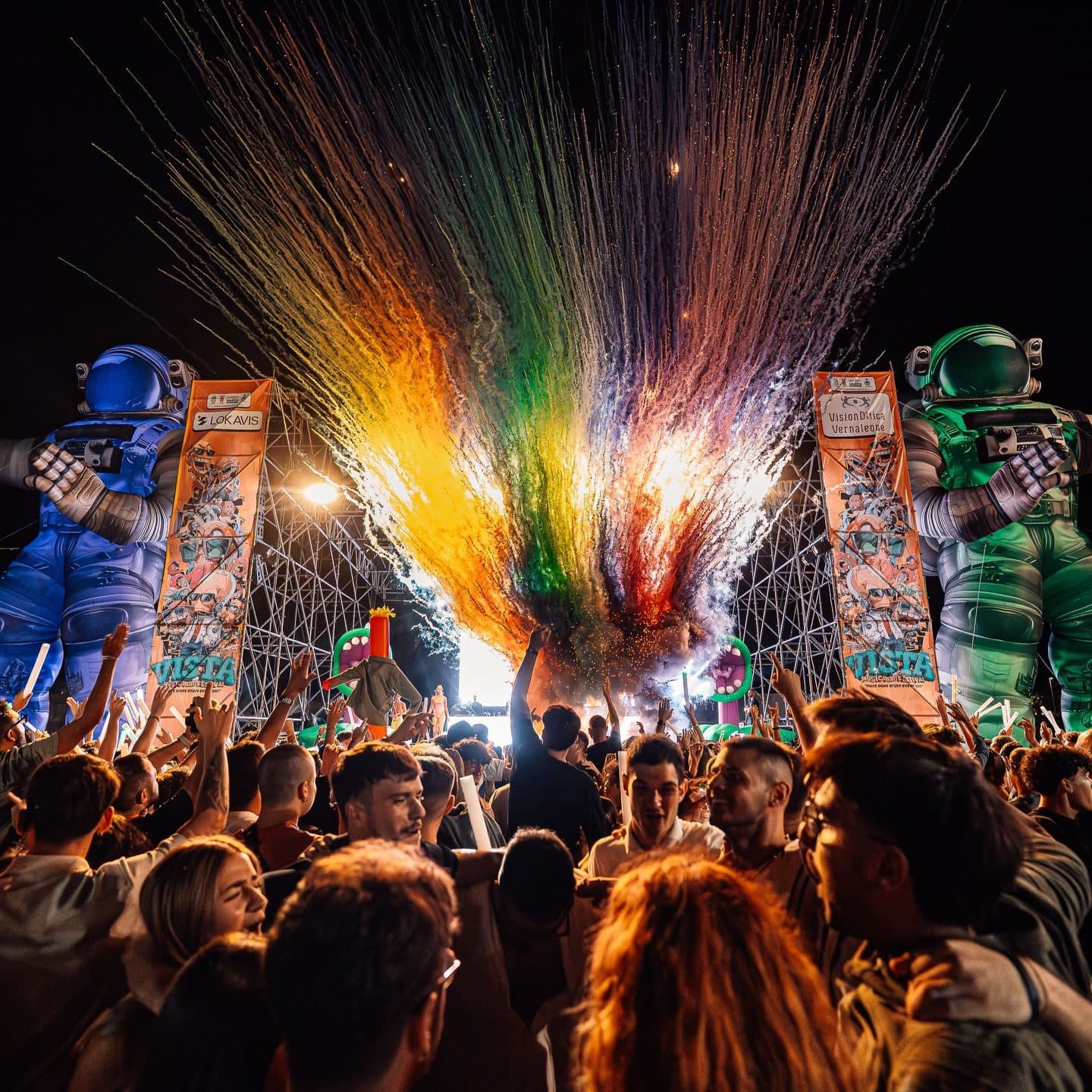 A fountain of coloured sparks over the crowd