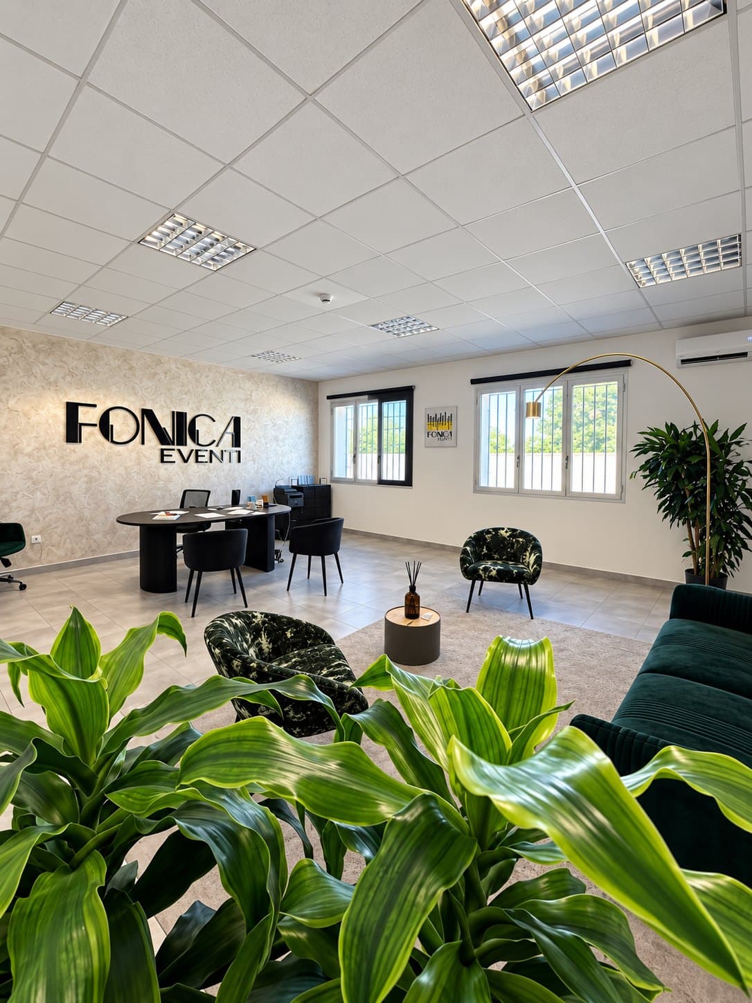 The office, with the Fonica Eventi mark on the wall